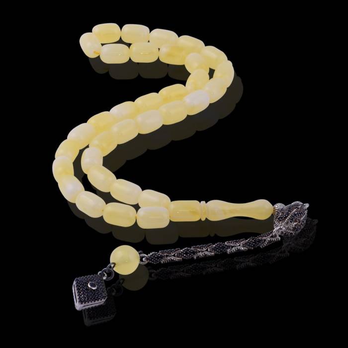 Capsule Cut Squeezing Amber Rosary with Silver Tassel 9 Gr Silver